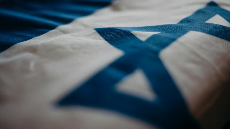 Israel Embassy Staff close up of the flag of israel